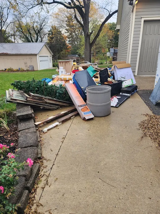 Dumpster being loaded with debris for 3 Yard Dumpster Rental in East Hempfield